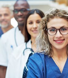 the-medical-team-standing-in-a-hospital-AVQYCPT